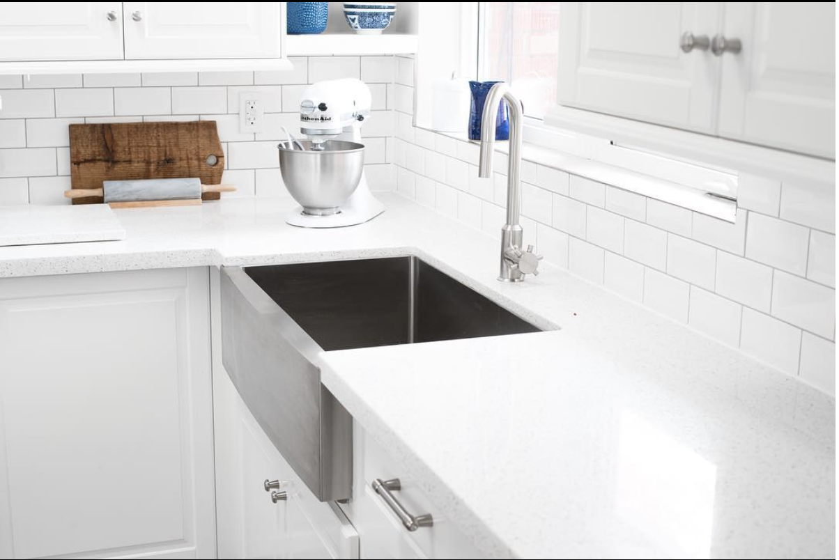 Modern white kitchen sink and table integrated design